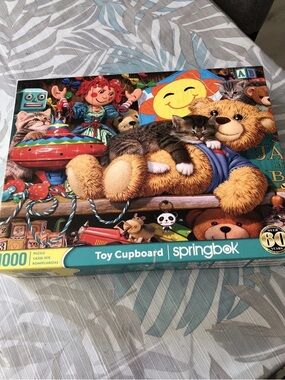 Springbok 1000 Pc Puzzle “Toy Cupboard”, Complete
